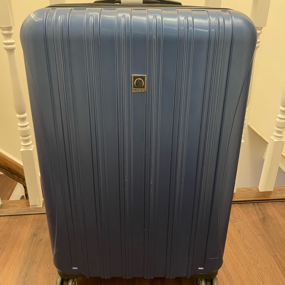 DELSEY Expandable Luggage w/ Spinner Wheels, Blue Textured, Checked-Large 29Inch
